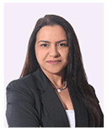 Professional headshot of a woman with long dark hair wearing a dark blazer.